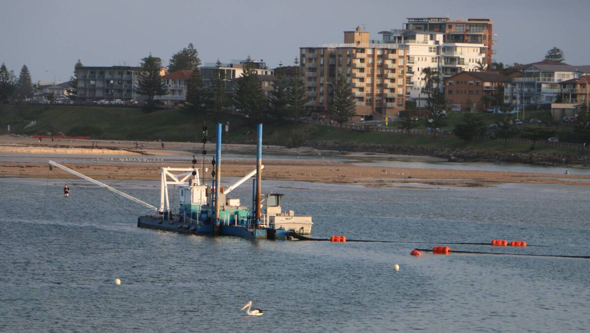CUT SHORT: The EPA said sand dredged from The Entrance channel must pass through an appropriate pollution control system for treatment before it can be discharged on North Entrance Beach. Picture: David Stewart
