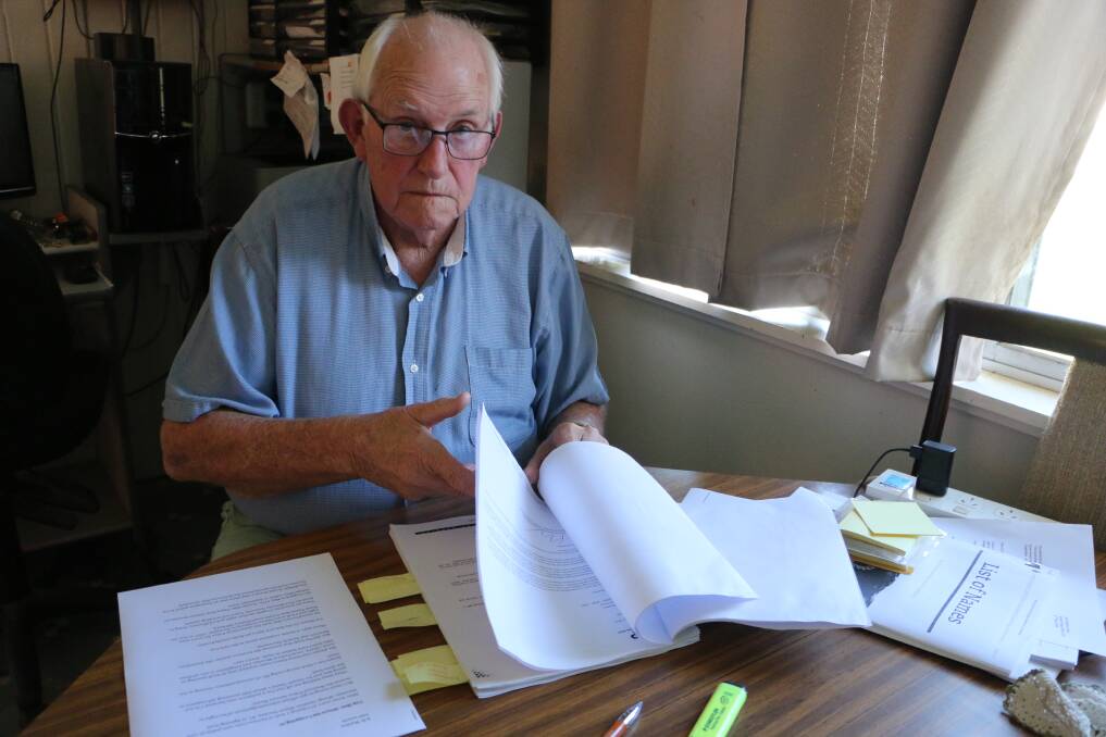 DIGGING DEEP: Alwyn Stuckey with a sample of the documentation and correspondence he has amassed over the years in pursuit of the National Police Service Medal. Picture: David Stewart