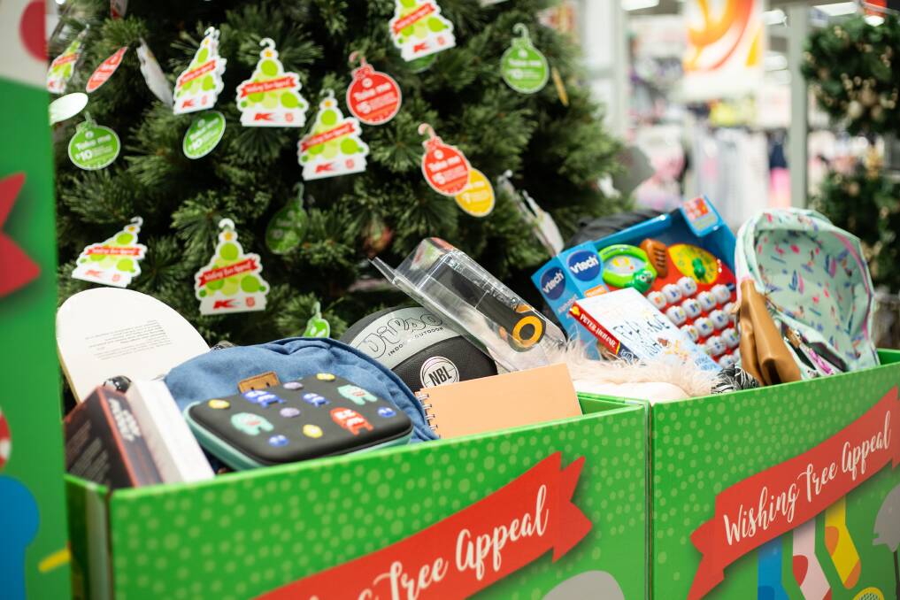 GET INVOLVED: Purchase and donate a present for a disadvantaged local by leaving it under the Kmart Wishing Tree at Lake Haven. Picture: Supplied