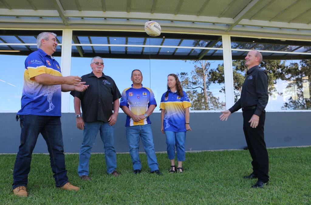QUICK HANDS: From left, Luke James, Rod Boyson, Allen Tierney, Beth Tierney and Phil Ticehurst outside Wangi Workers Club on Wednesday. Picture: David Stewart