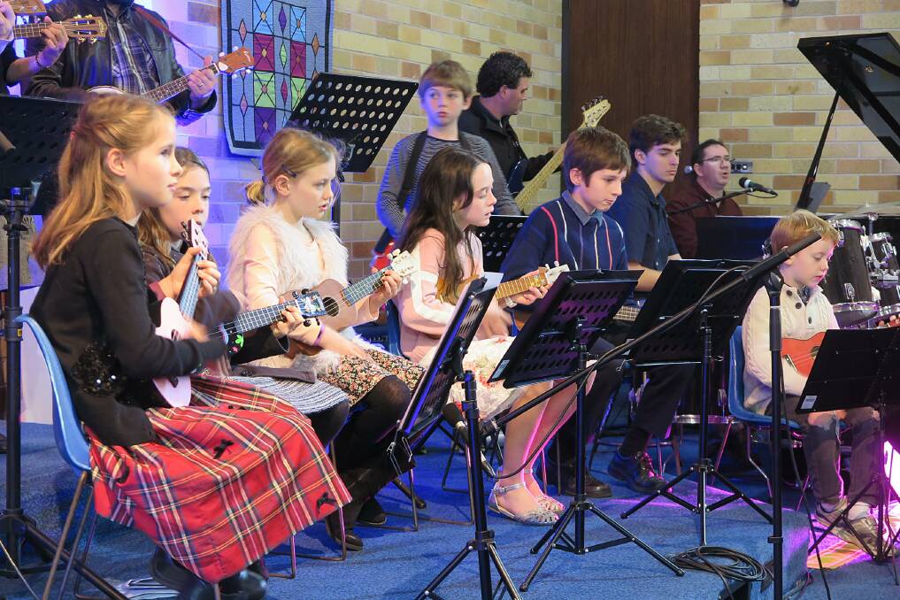 MUSICAL ITEM: The children's ukulele group perform at the Hillview Seventh-day Adventist Church on Saturday. The church is in Gimberts Road. Picture: Supplied