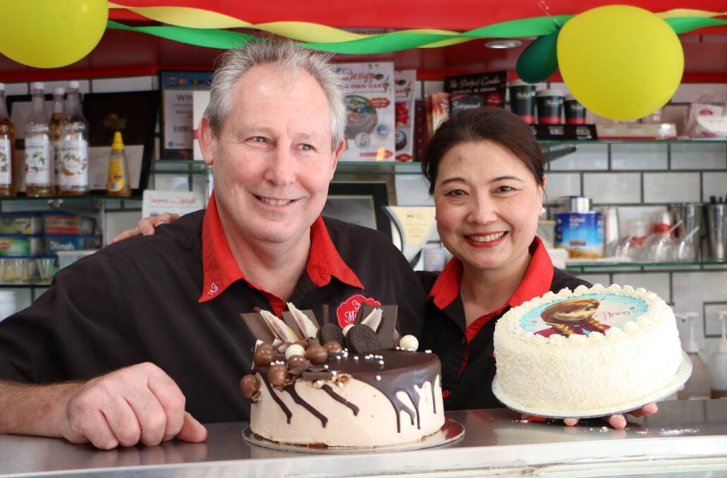 ANNIVERSARY: Greg Stevens and his wife Annie Li are pictured after the business was named Franchisee of the Year, and won the Supreme Award for Retailer of the Year, at the National Retail Association Awards, in 2016. Picture: David Stewart