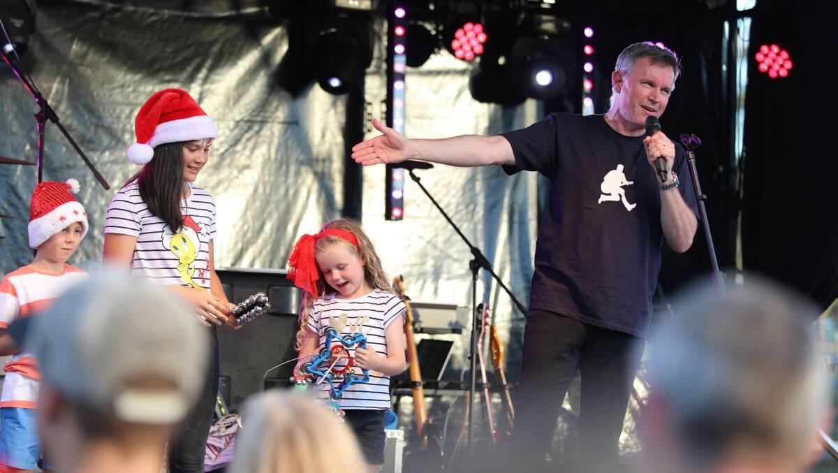 ENGAGING STAR: Christian artist and former 'Play School' host, Colin Buchanan, on stage at the Community Christmas Carols at Avondale School. Picture: Supplied