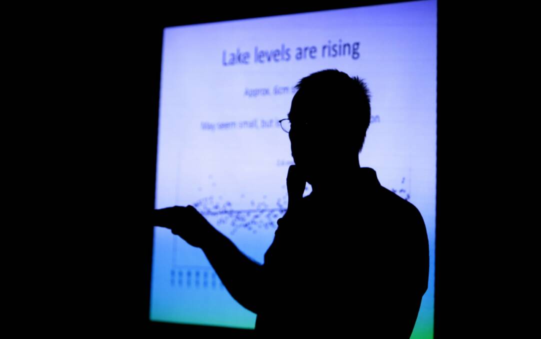 LOOKING UP: A public meeting was held at Marks Point in 2014 to discuss how to deal with sea level rise and its impacts on Lake Macquarie residents. Picture: Jonathan Carroll.