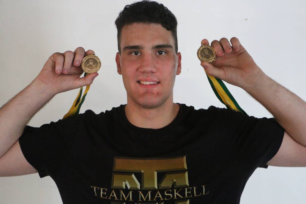 BACK TO BACK: Cruiserweight Tristan Maskell with his brace of Australian Amateur Boxing League national title medals. Picture: David Stewart