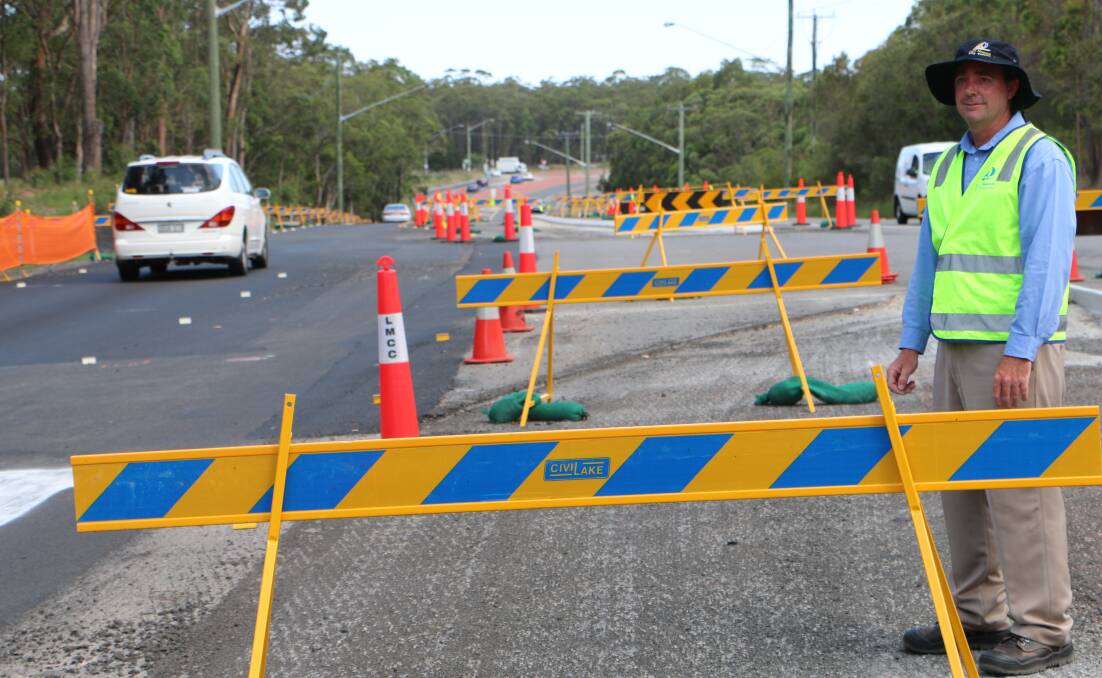 ROADWORKS: Council's Luke Ryan on Wangi Road, near the intersection with Wilton Road, at Rathmines. Picture: David Stewart