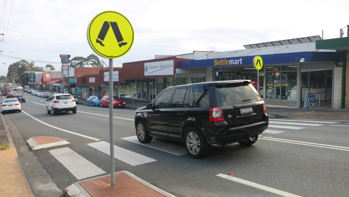 DANGER ZONE: The pedestrian crossing on Dora Street is accessed by people walking to and from the train station, as well as the Morisset shops. Picture: David Stewart