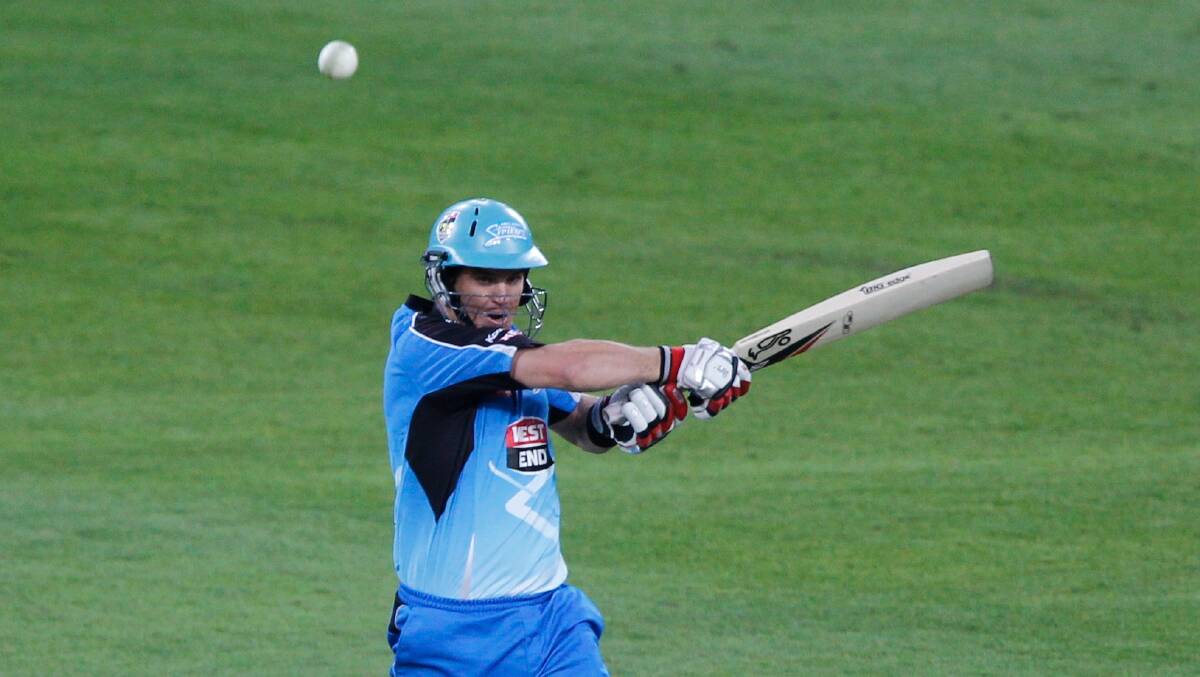 BANG: Adam Crosthwaite hammers a four over cover for the Adelaide Strikers in the Big Bash League in 2011. He and brother James will play for Toronto Workers in the local NCC Summer Bash. Picture: Quentin Jones 