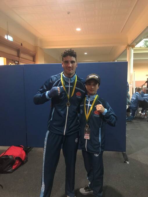 Maskell pictured with 12-year-old Zac Fitzpatrick, of Cessnock, who won his third national title in Hobart. Picture: Supplied.