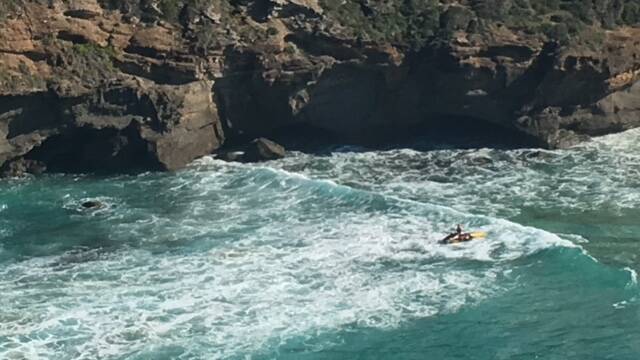MISSING: This image taken from the Westpac Lifesaver Rescue Helipcopter shows surf life savers on jet skis searching the area yesterday. Picture: Supplied