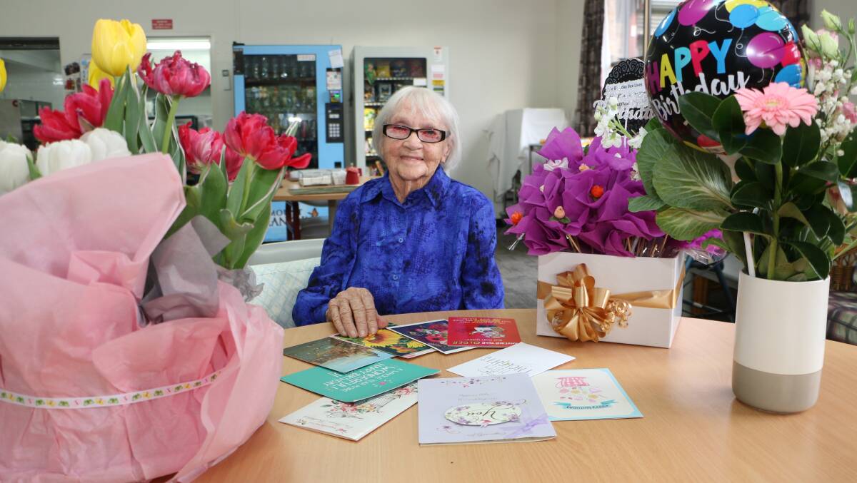 MUCH LOVED: Melva Henry with a sample of the flowers and cards received on the occasion of her 105th birthday on Friday. Picture: David Stewart