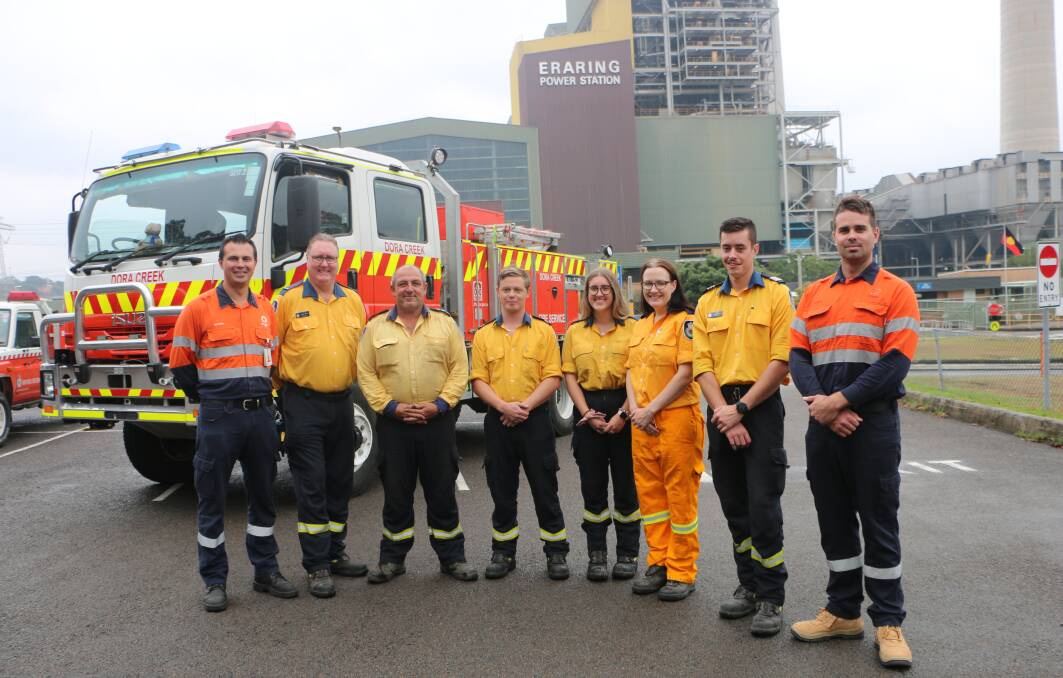 Representatives of the local RFS brigades with Origin's Antony Cotic, left, and shift manager Sam Brayley, right. Picture: David Stewart