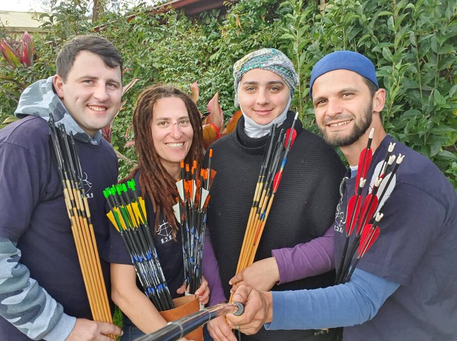 MUTUAL LEARNING: Local Sasha Buchmann, second from left, with new friends from the Maydaan Archers, a Sydney-based group learning horse archery at Martinsville. Picture: Supplied