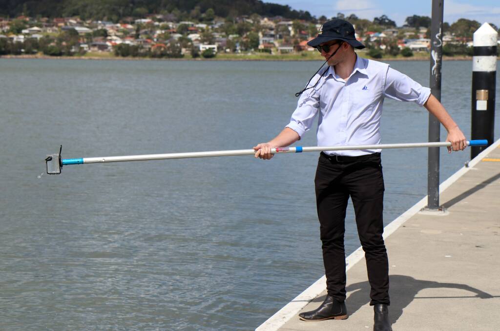 ALL CLEAR: Environmental health inspection officer James McNamara takes a water sample from the lake for testing. “These first results for the season are great news for people enjoying our lake and beaches," he said. Picture: Supplied