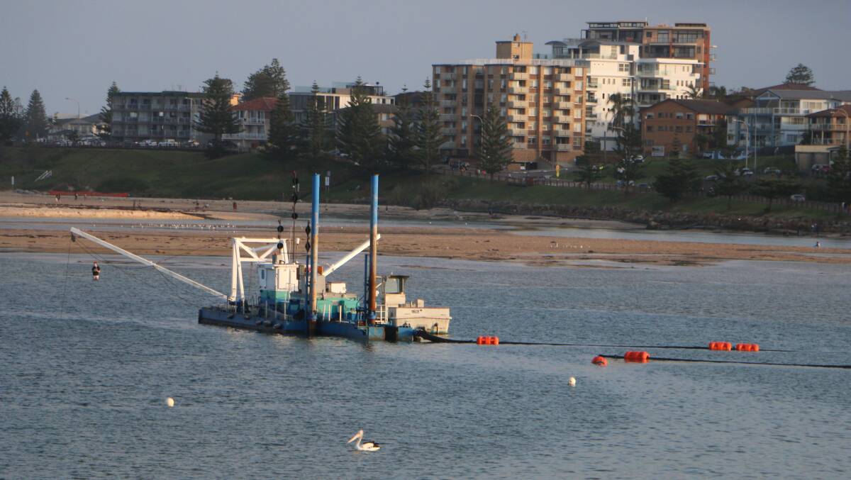 THIS SUCKS: Dredging in The Entrance channel ceased at the end of 2018. Locals said the subsequent build-up of sand had contributed to flooding. Picture: David Stewart