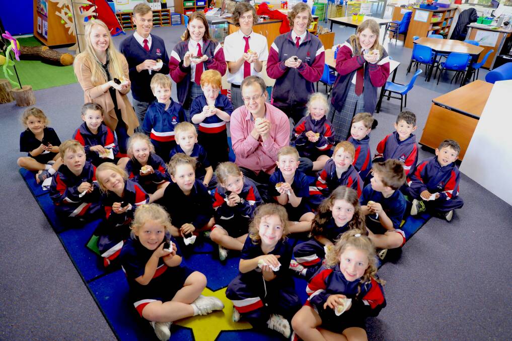 CHICK THIS OUT: Avondale's kindergarten class with the year 12 students who were part of the inaugural program hatched at the school. Picture: Terrina Mesaric