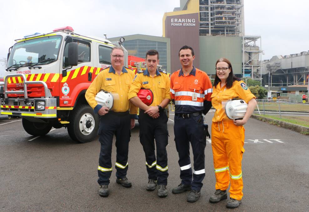 APPRECIATED: Origin's Antony Cotic (second from right) with, from left, local RFS personnel Graham Parker, Callun Tracy and Rebecca Smith at Eraring Power Station on Friday. Picture: David Stewart