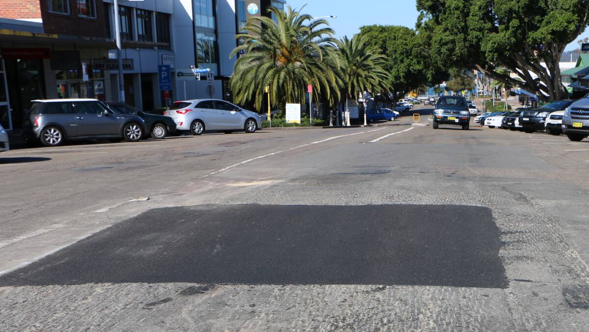 PATCHY: The road surface on The Boulevarde will be reconstructed this year, to bring it into line with the newly completed footpath, gardens, and street furniture. Picture: David Stewart