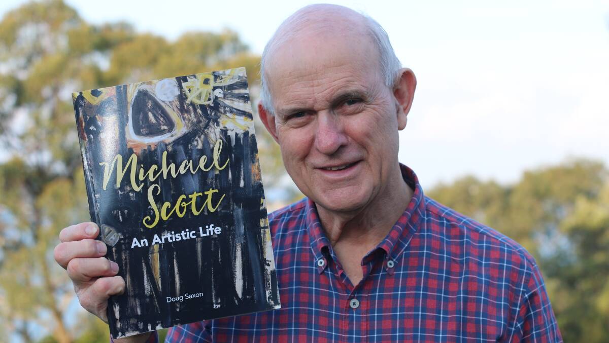SURPRISING READ: Doug Saxon with his latest book, 'Michael Scott: An Artistic Life'. It's the author's 16th self-published work. Picture: David Stewart