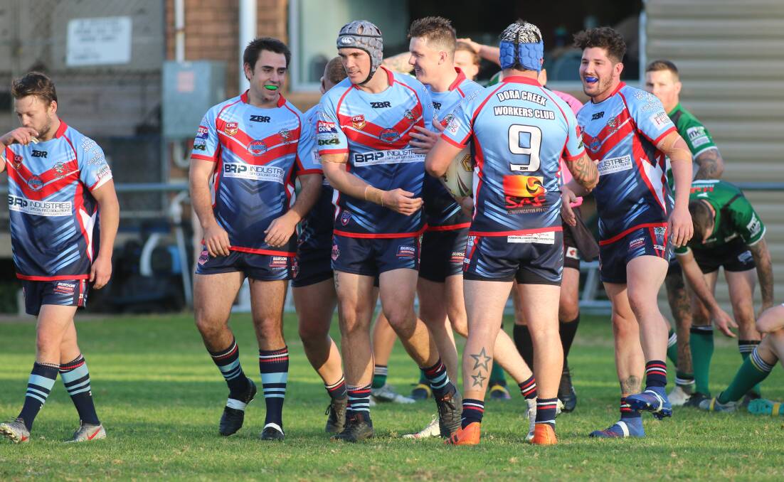 TRY TIME: Dora Creek celebrate another four-pointer. The team has come to expect opponents to be fired up and determined to bring the Swampies' unbeaten run to an end. Picture: David Stewart