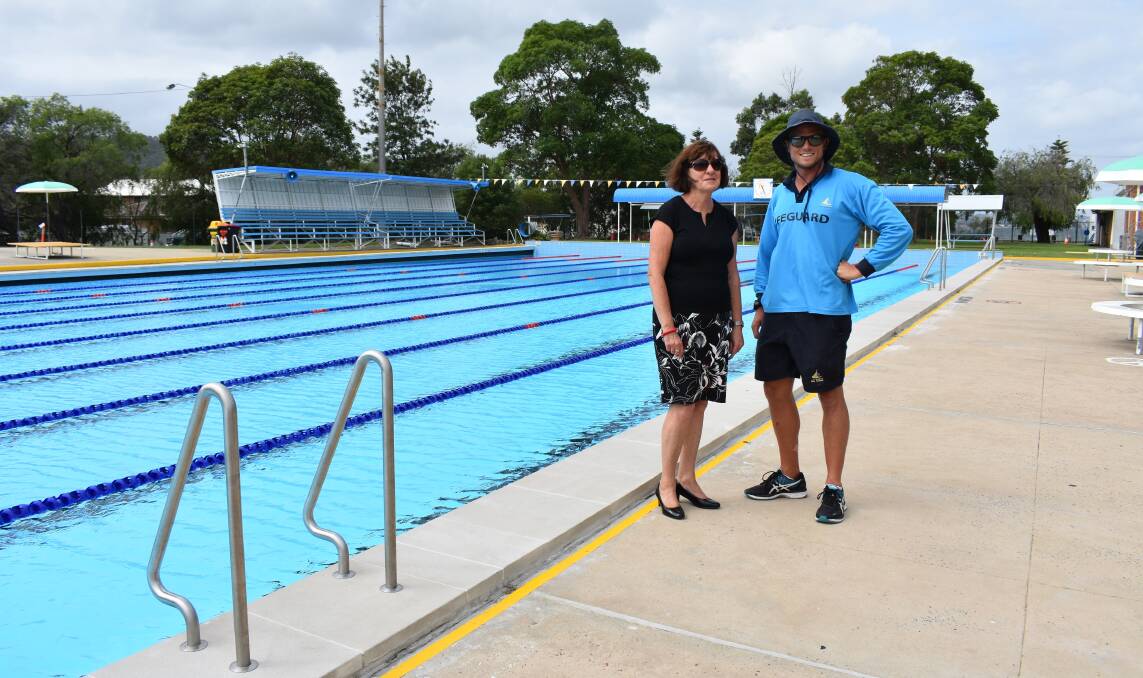 LONGER SEASON: Mayor Kay Fraser with lifeguard Sam Bright at Speers Point Swim Centre where a solar-powered water-heating system is to be installed. Picture: Supplied