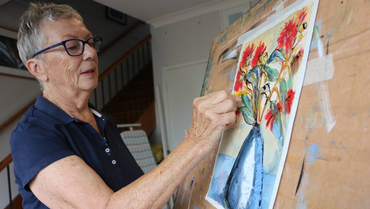EXPRESSION: Stephanie Macfarlane at work in her home studio. She's encouraging locals to enter their works in this year's Dobell Festival of Art and Craft. The closing date for entry forms is April 12. Picture: David Stewart