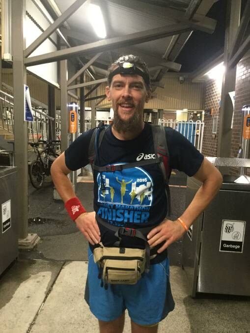 LET'S DO THIS: Mr King-Adams is pictured this morning just after 1am at the starting point for his run, Morisset Station. He hopes to arrive back at the station on Friday afternoon. Picture: Supplied