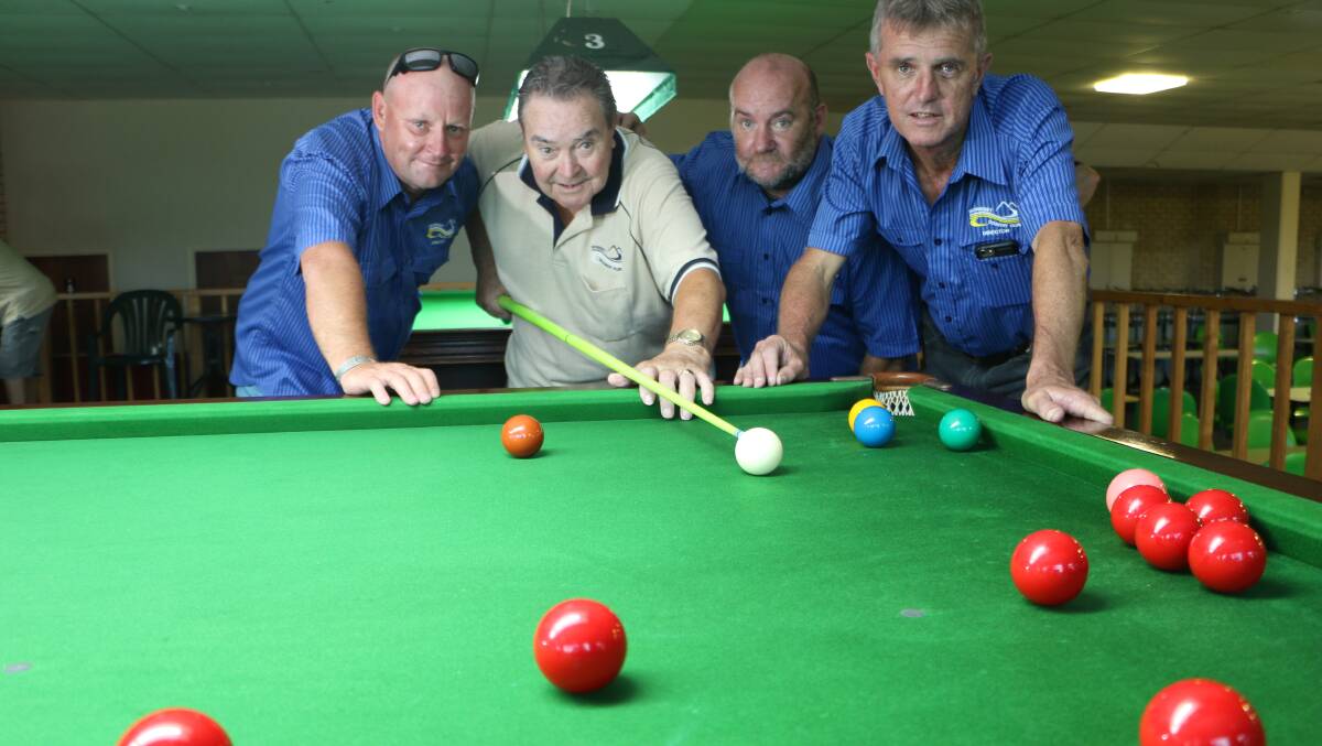 CALLED SHOT: Morisset Snooker Club president Noel Courtney with Morisset Country Club staff at the new table. The snooker club is welcoming new members for Wednesday and Monday games. Picture: David Stewart