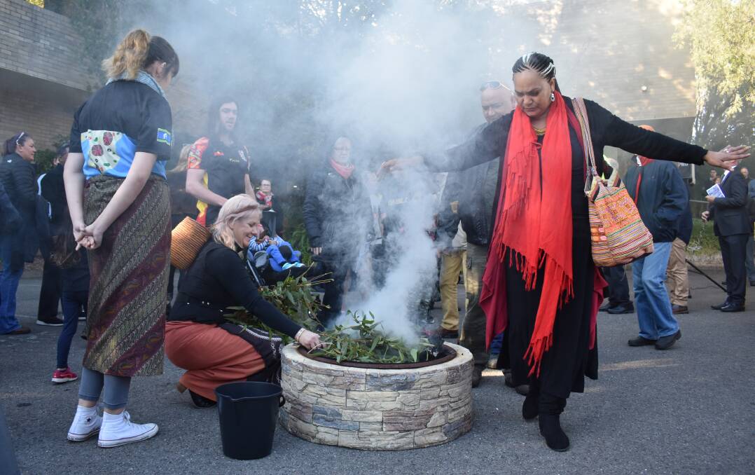 CULTURE: A smoking ceremony held as part of NAIDOC Day celebrations at Lake Macquarie City Council's headquarters in Speers Point. Picture: Supplied