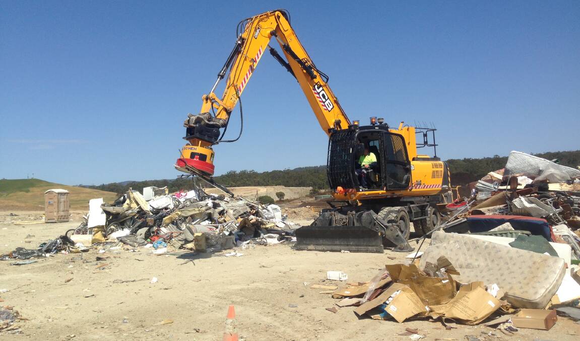 GOOD SORT: The specialised excavator sorts and salvages recyclables at Buttonderry Waste Management Facility. Picture: Supplied