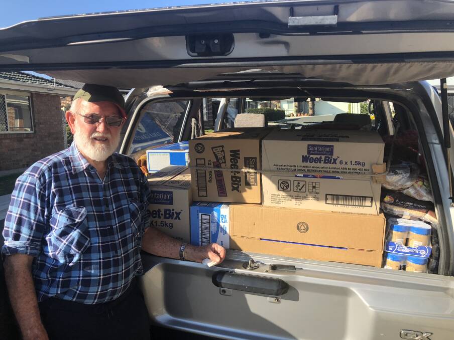 HELP ON WAY: Avondale Lifestyle Community resident Lionel Smith preparing to deliver relief packages to the drought-affected farming families in north-east NSW. Picture: Supplied