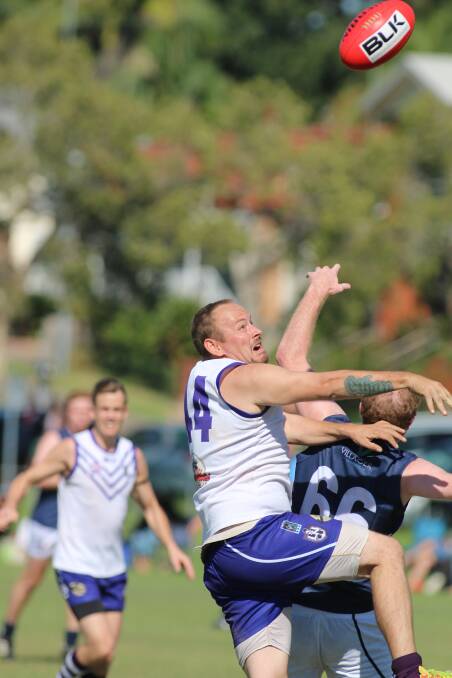 FIRST DIVISION: Harley Davis gets up to compete for possession for the Dockers. Picture: David Stewart