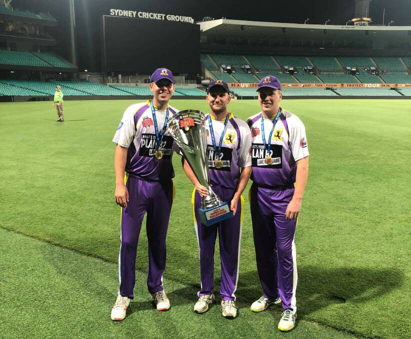 CHAMPIONS: Toronto Workers players (from left) Josh Westwood, Adrian Chad and Corey Brown with the Plan B Regional Bash trophy at the SCG. Picture: Supplied. 