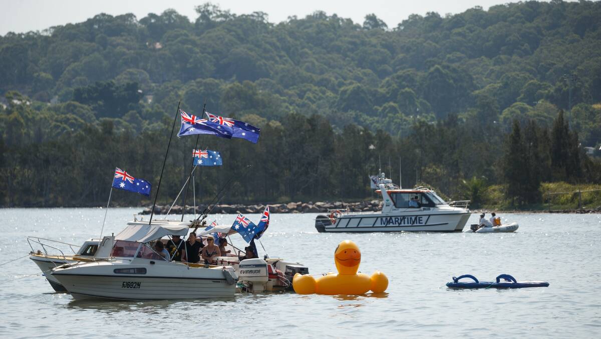 FLAGS FLYING: Revellers enjoying Australia Day on Lake Macquarie. A reader has suggested two dates the nation might prefer to celebrate. Picture: Max Mason-Hubers 
