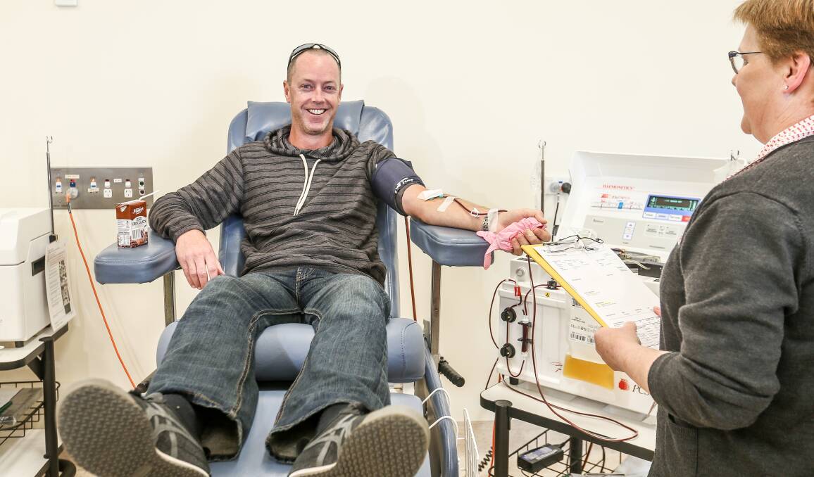 ROLL UP: Follow the example of Chris White, who is a regular donor, when the Red Cross mobile blood bank comes to Morisset on Tuesday. Picture: Christine Ansorge