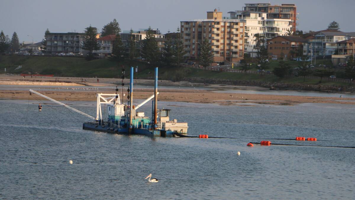 FINISHED NOW: The sand dredge in The Entrance channel. Picture: David Stewart