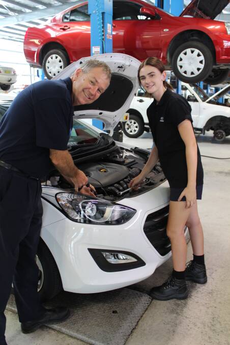 OPPORTUNITY: Montana Hottes spends one day a week at Booths Motor Group with supervisor Alan Milliner as part of her school-based apprenticeship. Picture: Supplied 