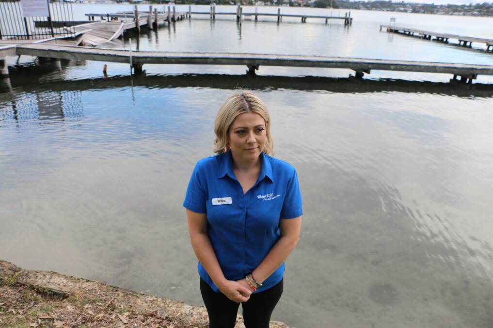 START DATE: Wangi RSL Club's Denise Dover at the dilapidated public jetty behind the club. It's been closed since 2017. Picture: David Stewart