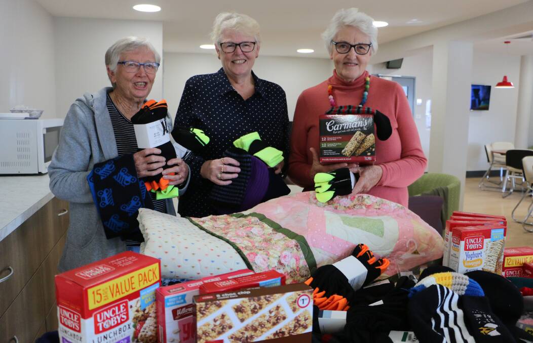 Staff at Toronto Private Hospital have showed their generosity and appreciation for Toronto Adventist Church's Care Ministeries by donating piles of new clothing and foodstuffs for homeless people. Picture: David Stewart