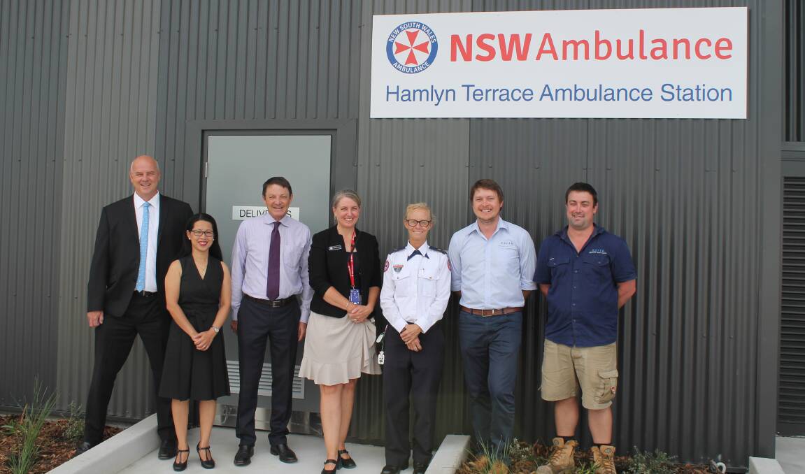 Liberal candidate for Wyong, Ying Shu Li-Cantwell, second from left, with Scot MacDonald and NSW Ambulance staff and building contractors at the new building. Picture: Supplied
