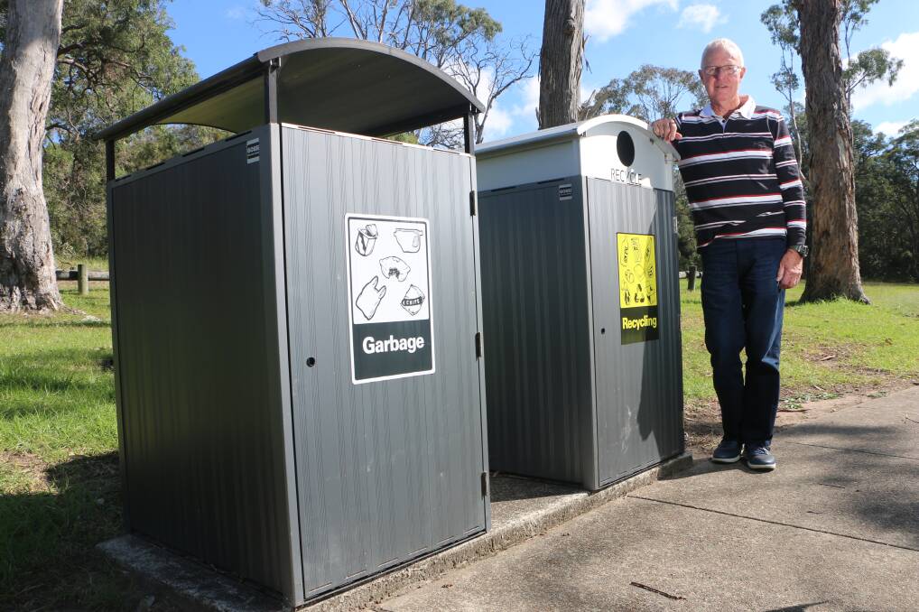 BIN THERE: Ross Wylde-Browne of Rathmines Area Sustainable Neighbourhood Group at two of the new bins near F Jetty. Picture: David Stewart