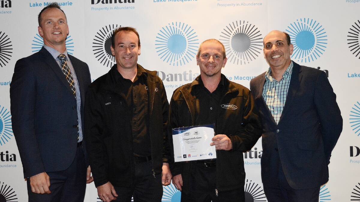 NAME GAME: Pictured, from left, are Dantia development executive Derrek Lush, Gibbo's Auto Electrics co-owners Scott Dunks and Paul O'Brien, and Dantia chief executive Peter Francis, at the 200 Club draw at Belmont 16s. Picture: Supplied