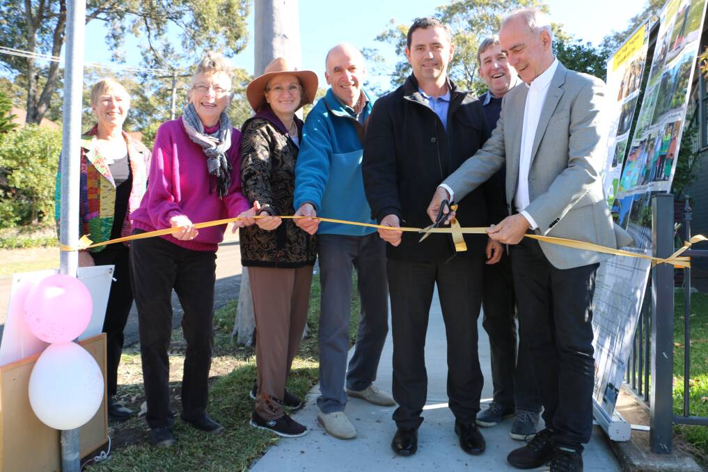 Nico Marcar, fourth from left, representing TASNG at the opening of the Brighton Avenue footpath in 2017. Picture: David Stewart