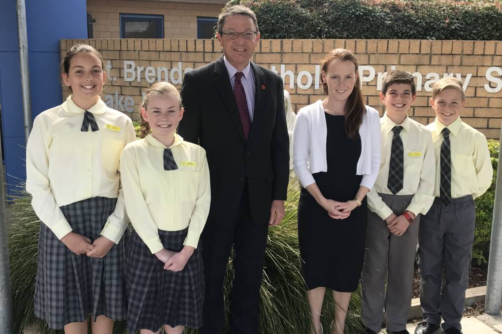 GROWING SCHOOL: Scot MacDonald with assistant principal Kellie Prendergast and St Brendan’s Catholic Primary School leaders. Picture: Supplied