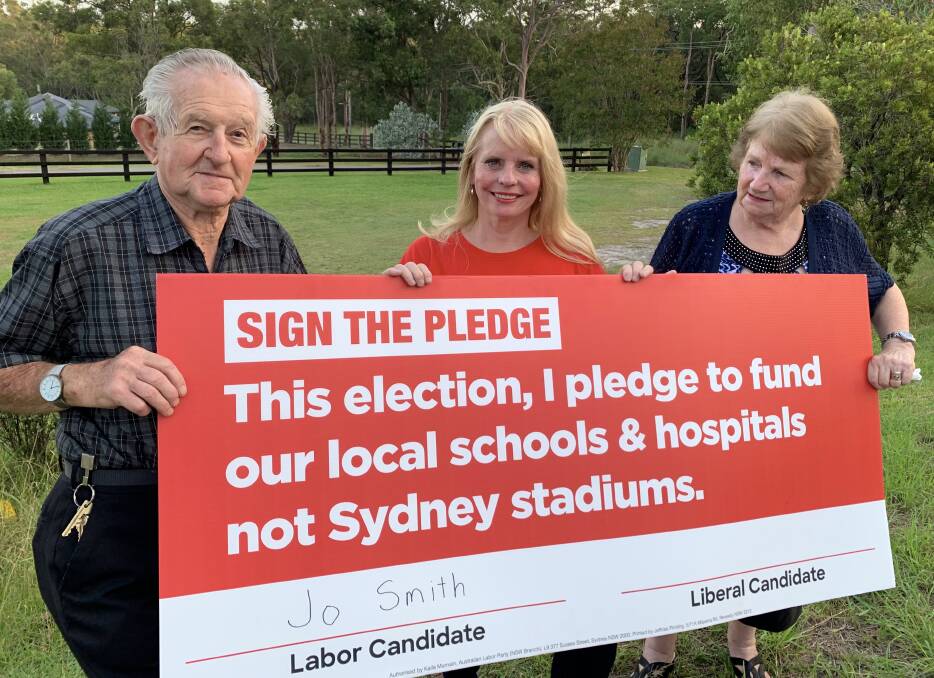 MESSAGE: Labor candidate Jo Smith, centre, with former Morisset Hospital employees Bill and Lorre Manning. Ms Smith wants to see more government funding to restore the sprawling and historic health facility. Picture: Supplied