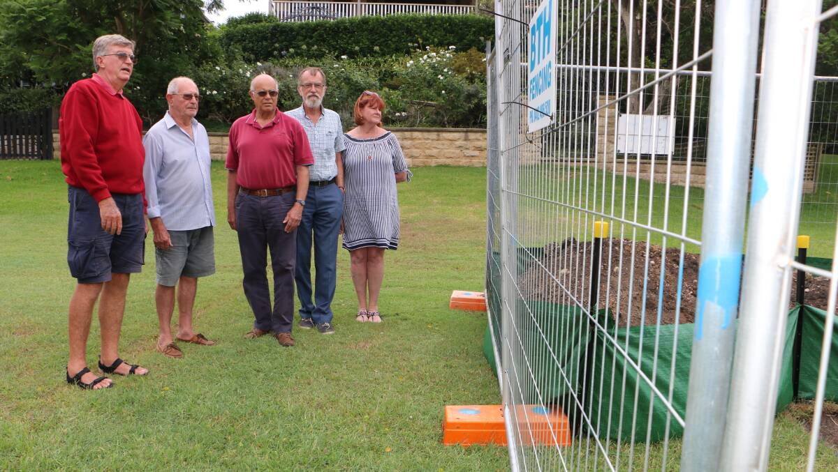 NOT IMPRESSED: From left, Puna Road residents Ross Dickson, Barrie Mitcheson, Paul Hamilton and Keith and Leanne Howard at the site of the exercise station on the public reserve near their homes. Picture: David Stewart