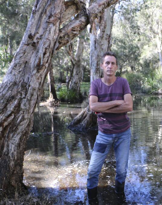 MOZZIE COUNTRY: Resident Mark Mannile at Dora Creek, where testing last year revealed local mosquitoes were carrying Barmah Forest virus. Picture: Jamieson Murphy