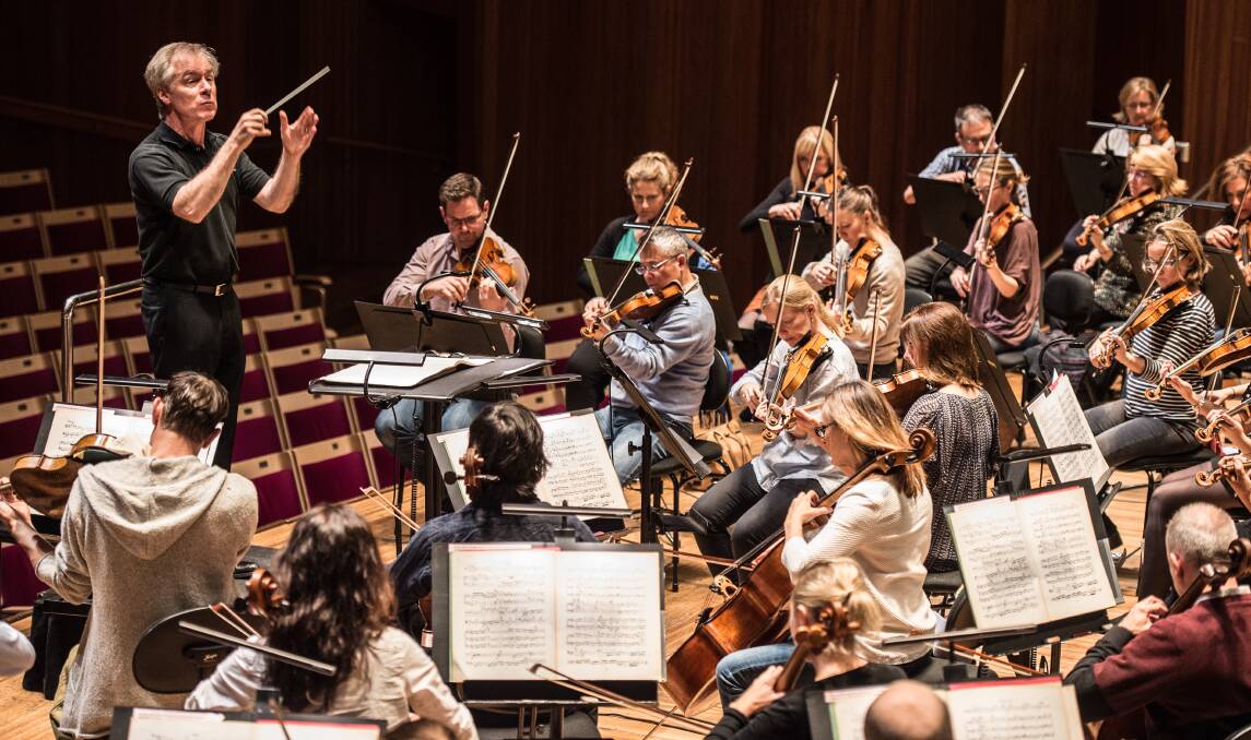 BIG SOUND: Chief conductor David Robertson leads Sydney Symphony Orchestra in rehearsal. Picture: Wolter Peeters