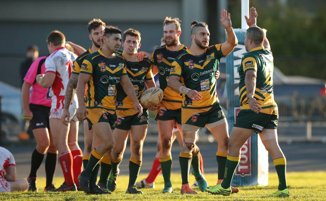 ON TOP: Macquarie Scorpions celebrate one of fullback Mitch Manson's two tries against South Newcastle on Sunday. Picture: Max Mason-Hubers