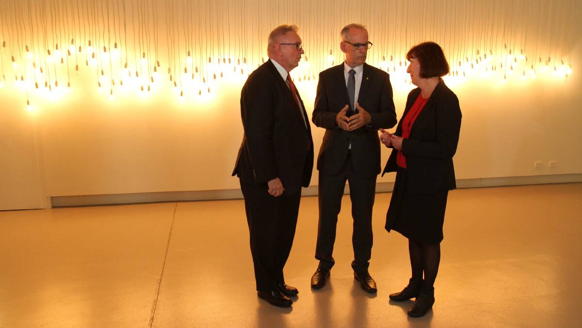 EXHIBITION SPACE: From left, Arts Minister, Don Harwin, State Member for Lake Macquarie, Greg Piper, and mayor Kay Fraser at the gallery for the funding announcement last year. Picture: Supplied